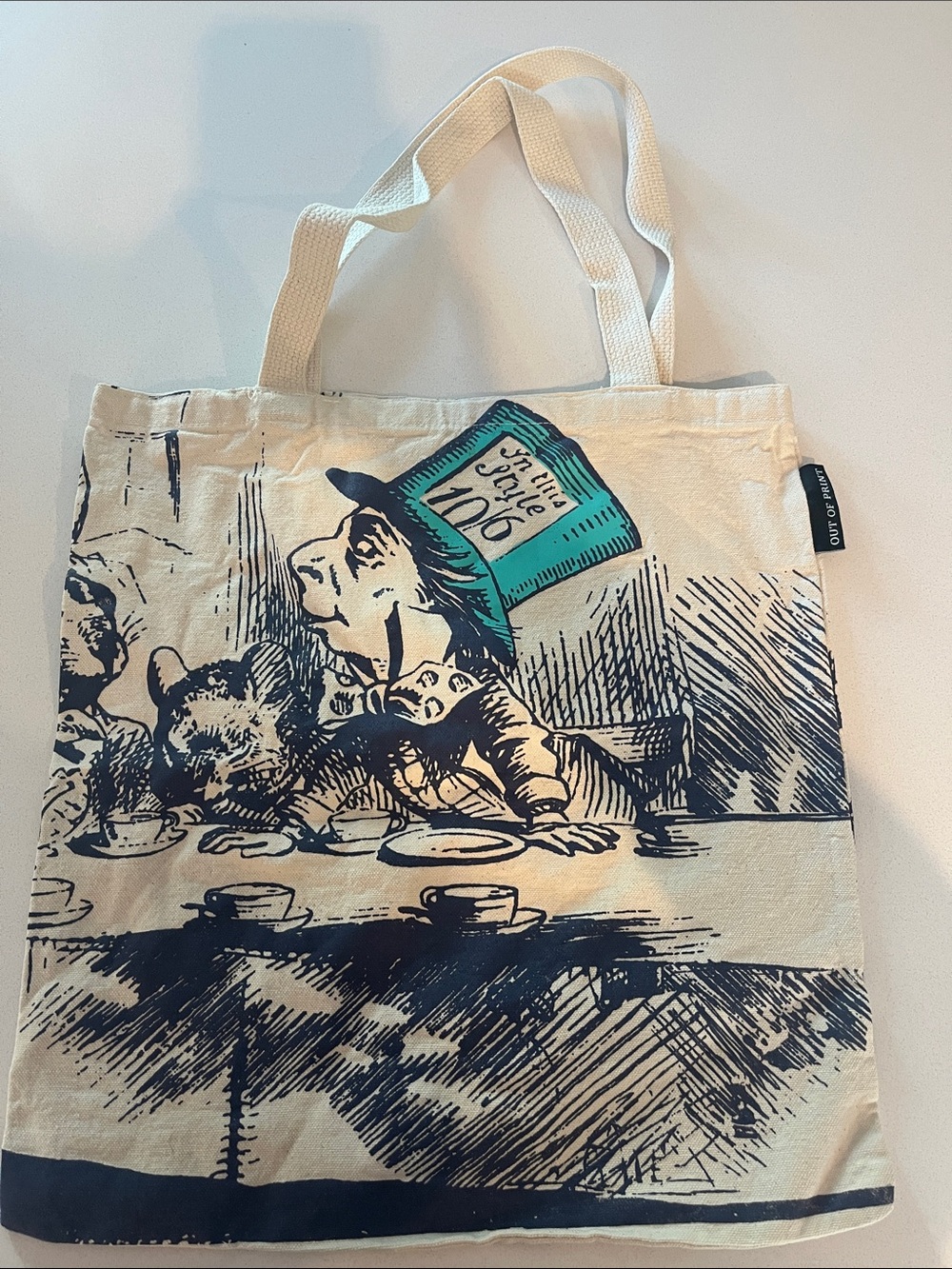 Out of Print Cream Canvas Tote-Alice in Wonderland